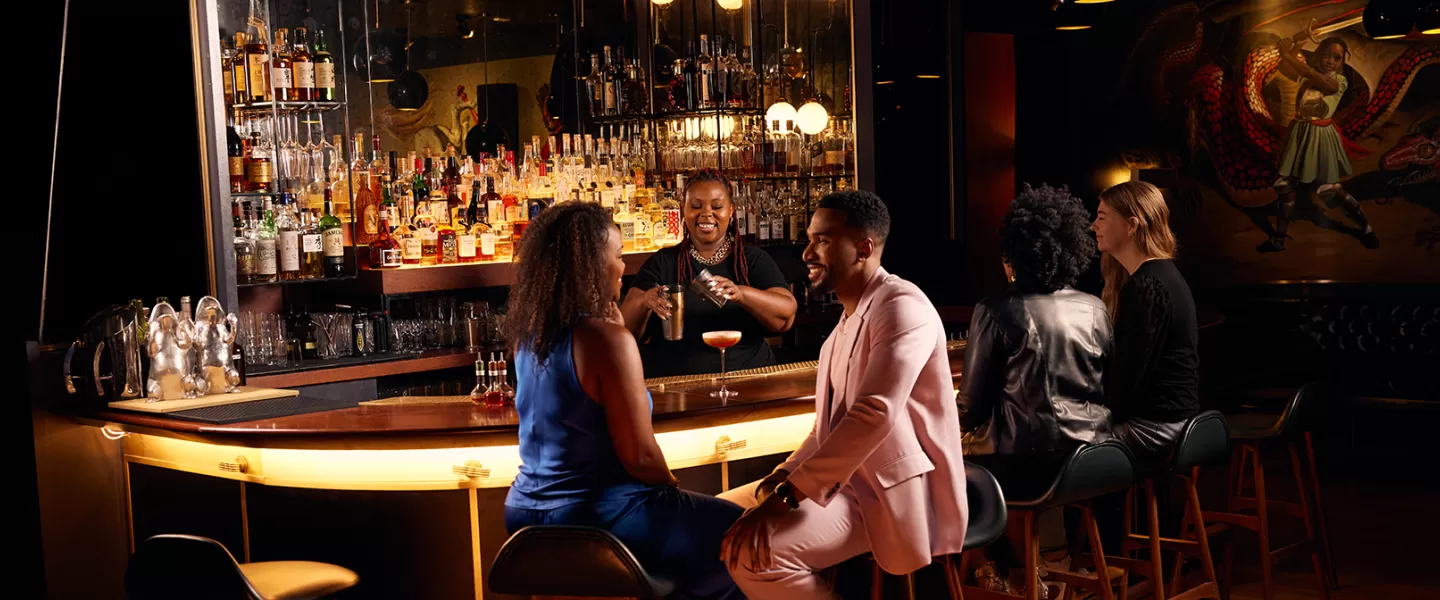 Couple dining at bar